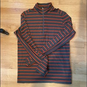 Mens Ibex half zip size M. Orange and gray stripe. Baselayer weight.